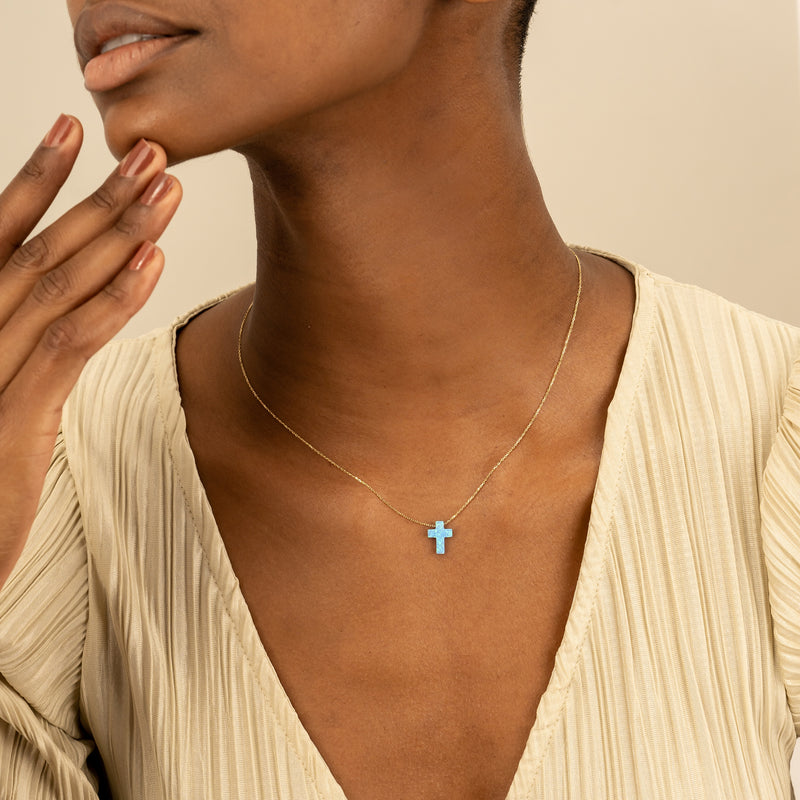 opal cross necklace in  solid gold