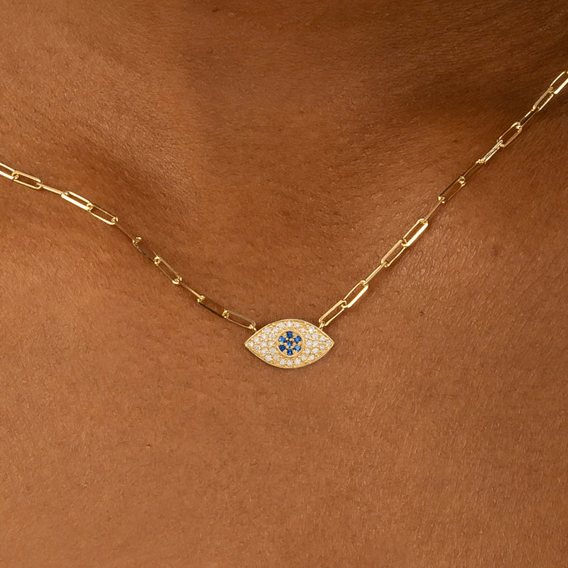Diamond and sapphire protection eye necklace in solid gold