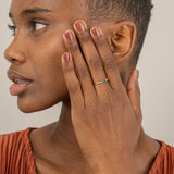 Simplistic Diamond and Emerald Engagement Ring