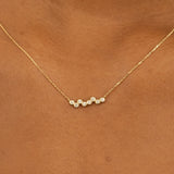 Round Bezel Diamonds on dainty solid gold necklace