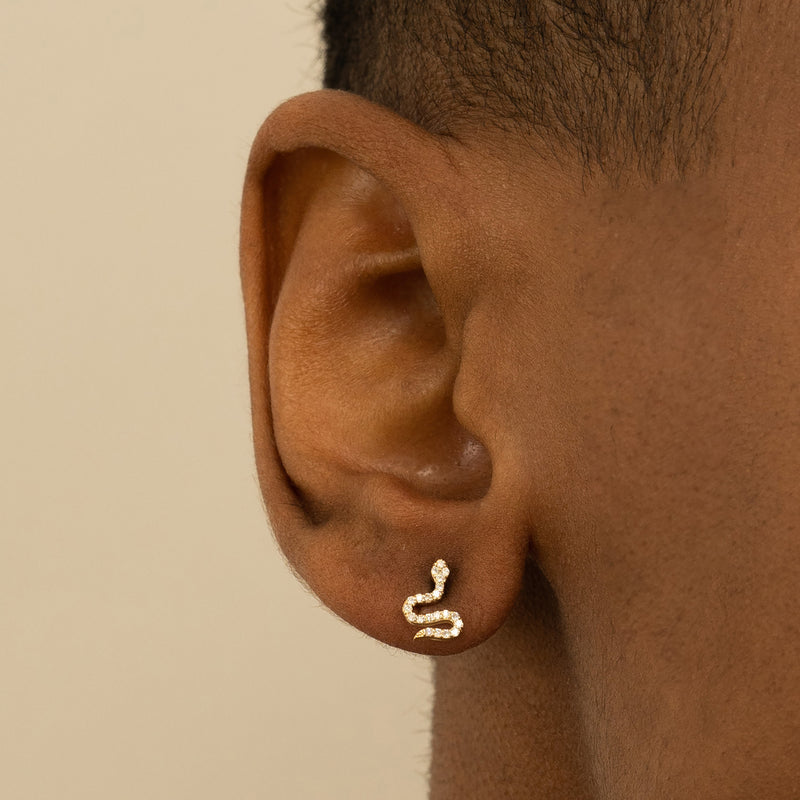 Model wears Minimalist Diamond Snake stud earrings