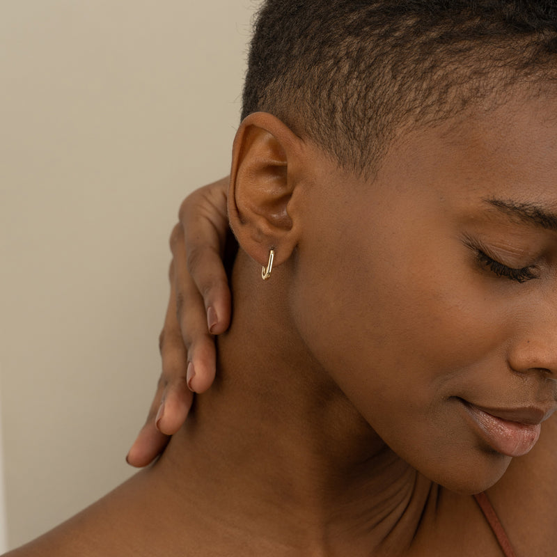 Minimalist U shape solid gold ear huggie for her