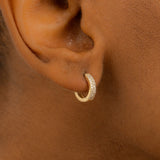 Model wears thick Dainty Diamond lined Hoop Earring huggies