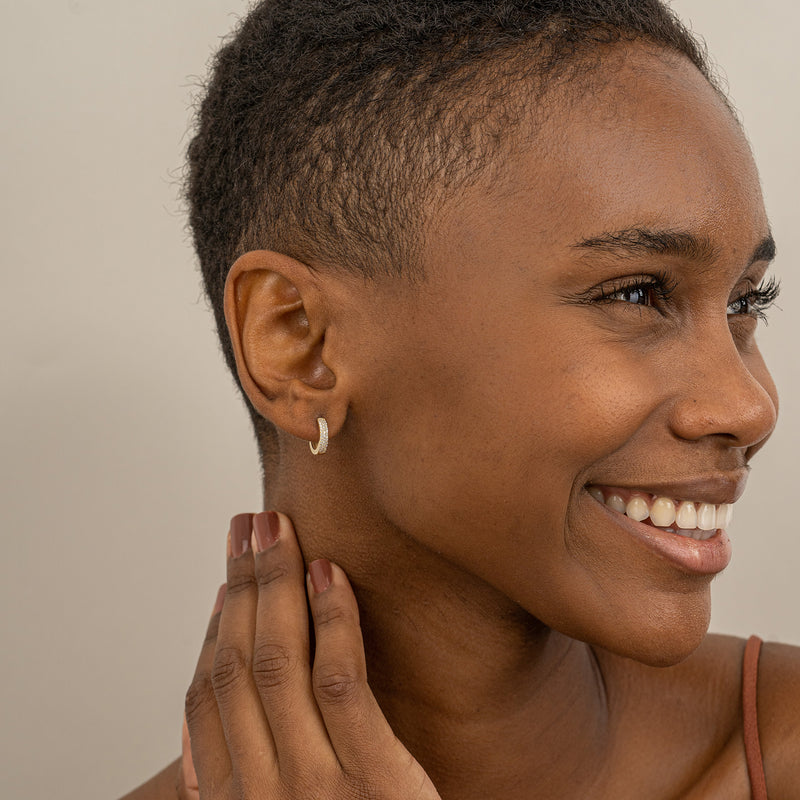 Model wears 14kj Solid Gold Handmade Diamond Hoop huggies