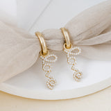 Dainty pair of Handmade Diamond Love huggie Earrings