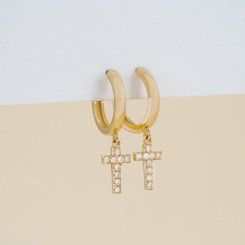 Pair of solid 14k gold Diamond Cross huggies