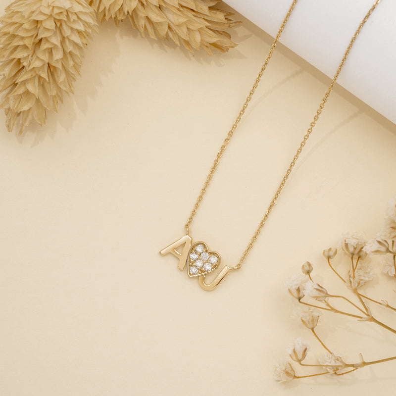 Design your own initial heart necklace! Choose two initials and let the sparkling heart be a symbol of your love.