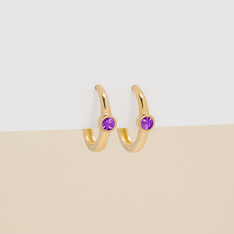 Dainty pair of 14k Solid Gold Amethyst Huggies