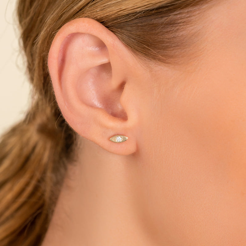 Model wears Solid Gold Handmade Eye shape dainty Studs