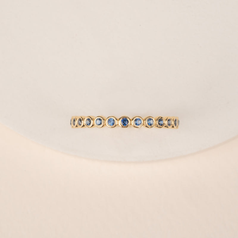 Bezel Sapphire Half Eternity Band