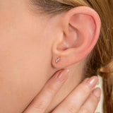 Model wears handcrafted Natural Diamond Lightning bolt stud Earrings
