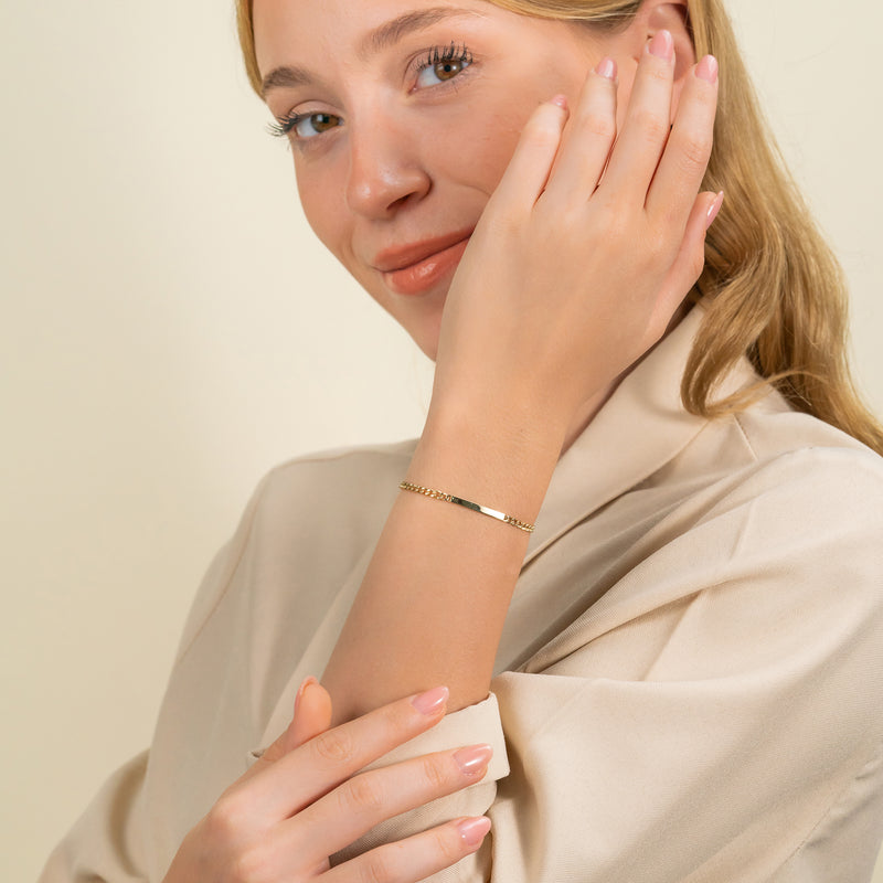 Gold nameplate bracelet ready for engraving.