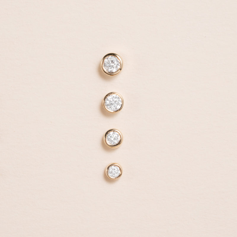 multiple sizes of Petite Diamond bezel Gold Stud Earrings