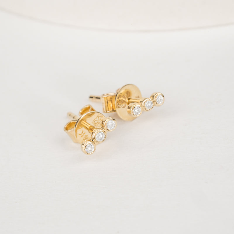 Triple Diamond Bezel Set Stud earrings in solid gold 