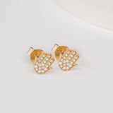 Pair of solid 14k gold hamsa hand stud earrings with diamonds April birthstone