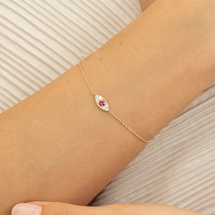 minimalistic design handmade ruby evil eye bracelet
