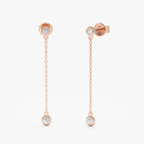 Pair of solid 14k rose gold long hanging diamond bezel earring studs
