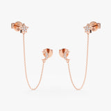 handmade pair of solid 14k rose gold moon and star stud earrings with hanging chain
