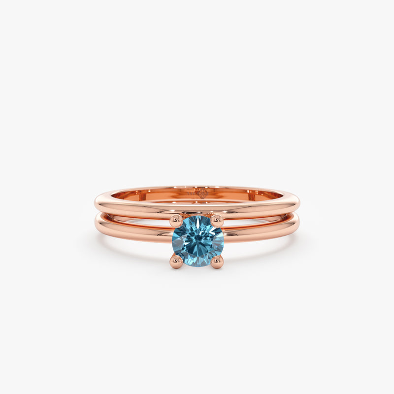 Blue diamond rose gold engagement ring