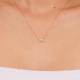 Gold elephant necklace with diamonds