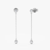 Handcrafted pair of solid 14k white gold hanging diamond bezel earring studs
