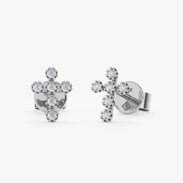 handcrafted pair of solid 14k white gold multiple diamond prong cross stud earrings