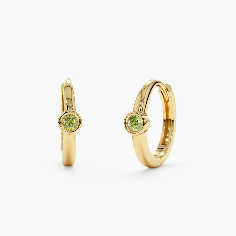 Pair of solid 14k Gold Peridot Huggies