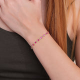 Yellow gold diamond and ruby tennis bracelet