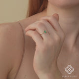 pear diamond baguette emerald ring