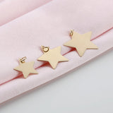 minimalistic star necklace charms in solid gold and various sizes