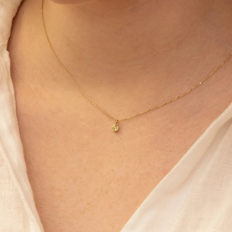 dainty natural peridot charm pendant necklace in solid gold