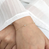 petite celestial star bracelet with bezel diamonds