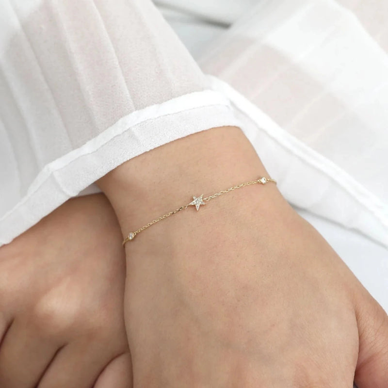 petite celestial star bracelet with bezel diamonds