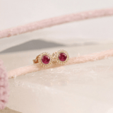 Pair of dainty handmade July birthstone ruby ear studs in art deco style bezel