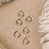 Dainty solid 14k gold hoop huggie earrings with diamond